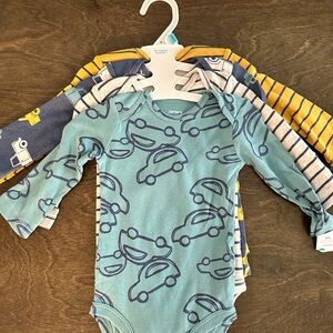 Carter’s 4-Pack Long Sleeve Bodysuits – Size 6 Months (NWT)